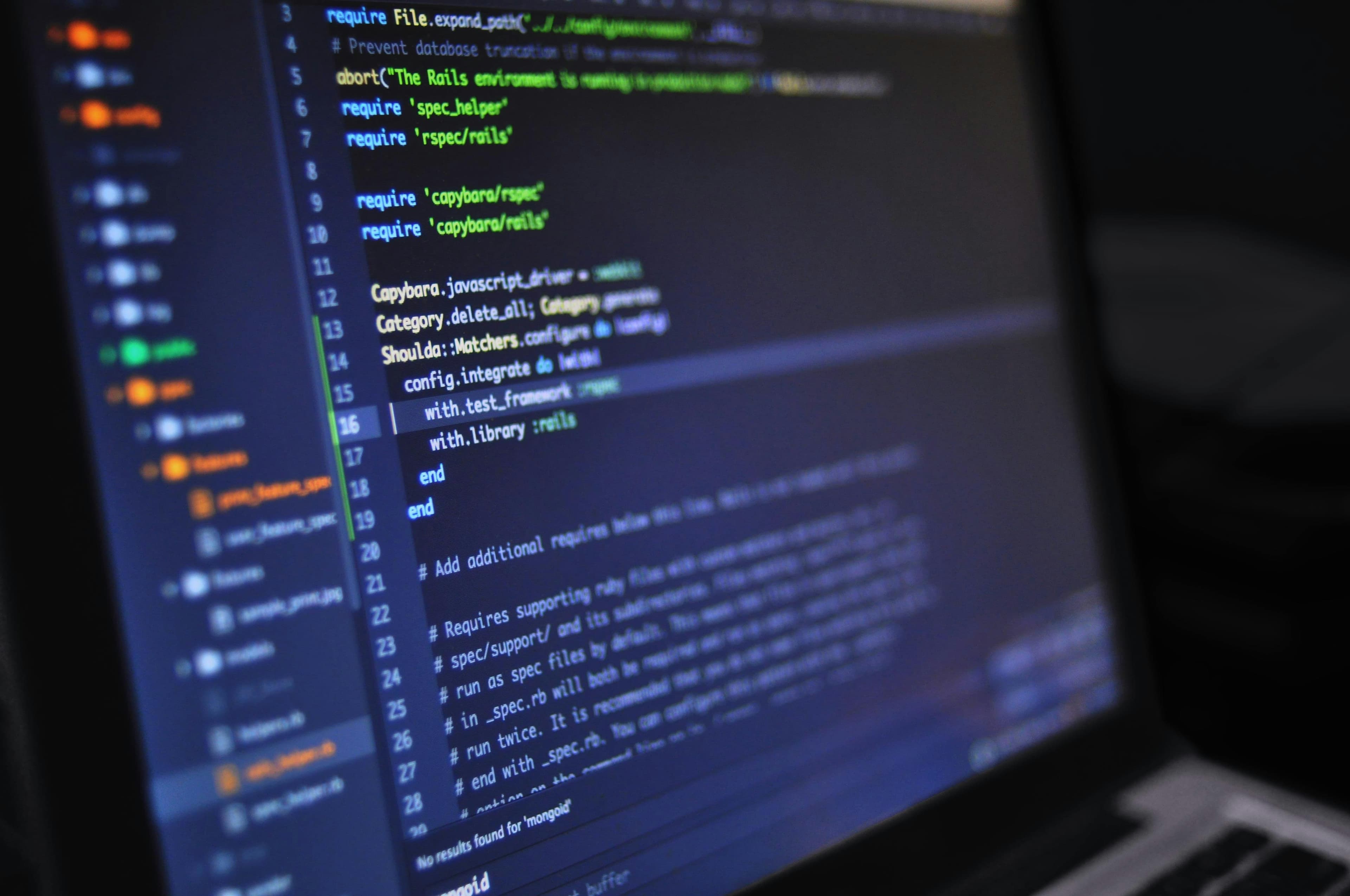 Code on a dark computer screen